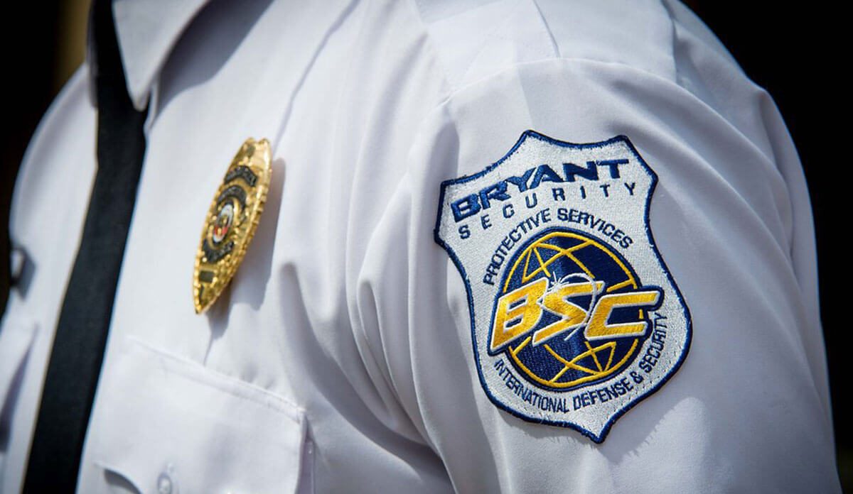 bryant security guard badge on uniform
